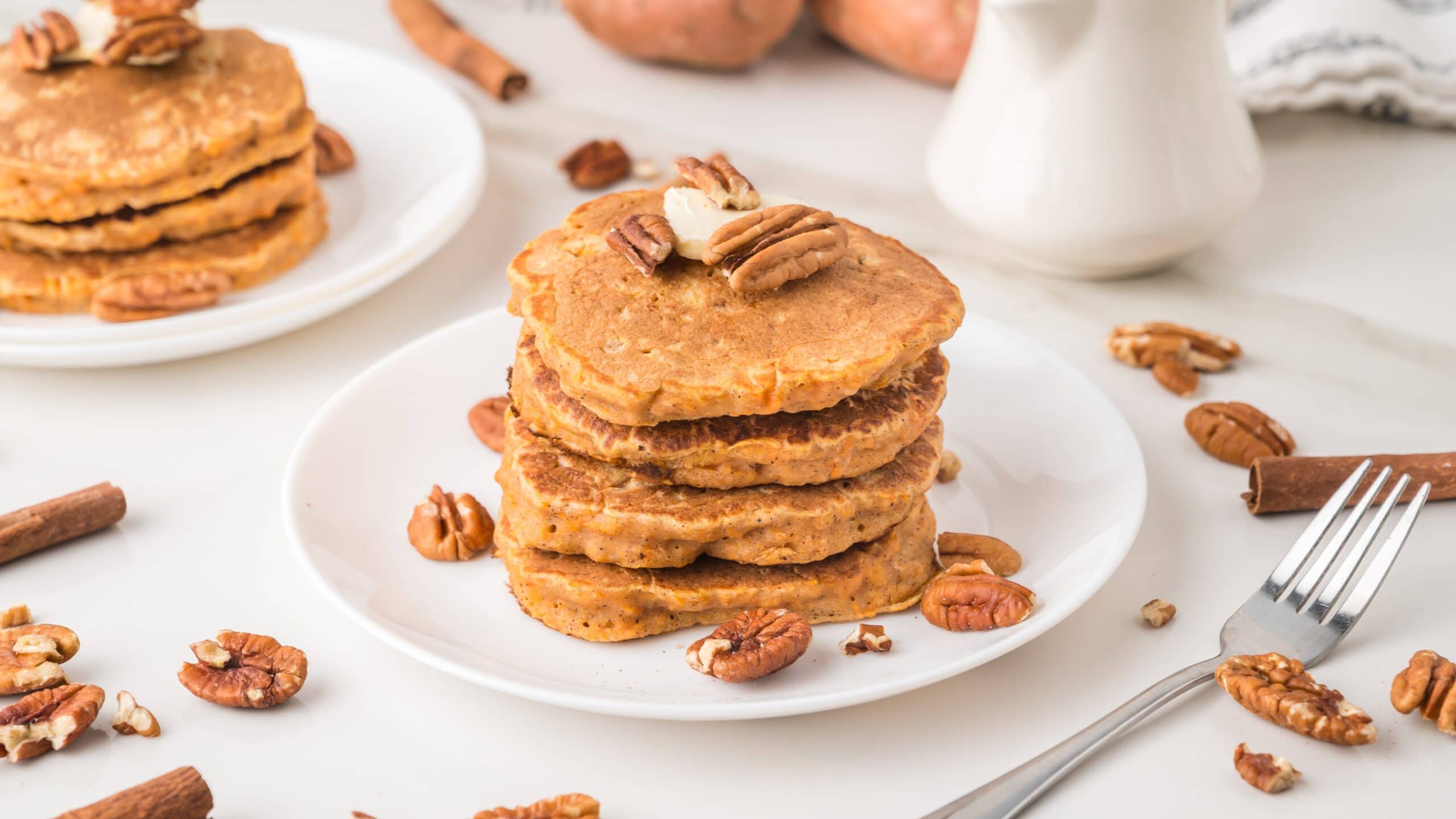 Fluffy sweet potato pancakes with maple syrup