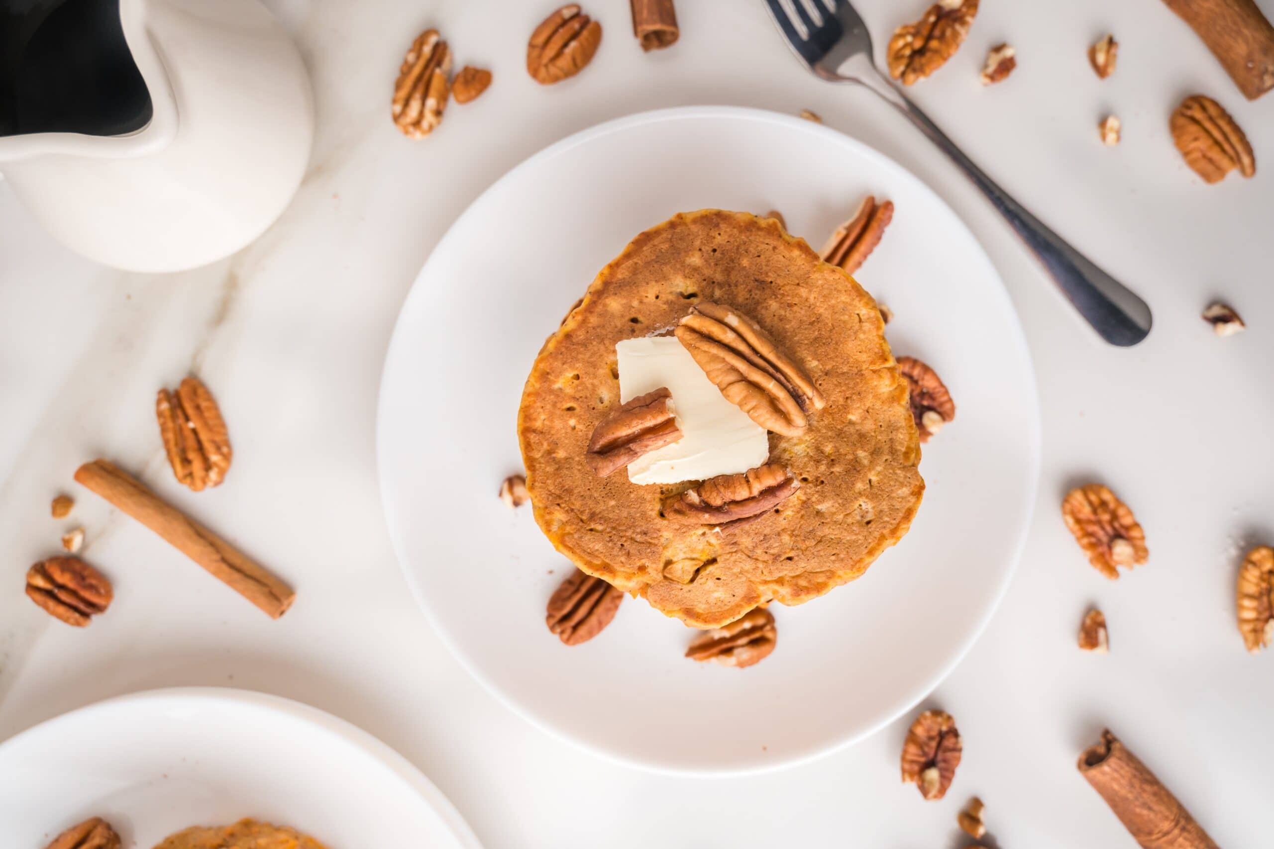 Homemade sweet potato pancakes with maple syrup