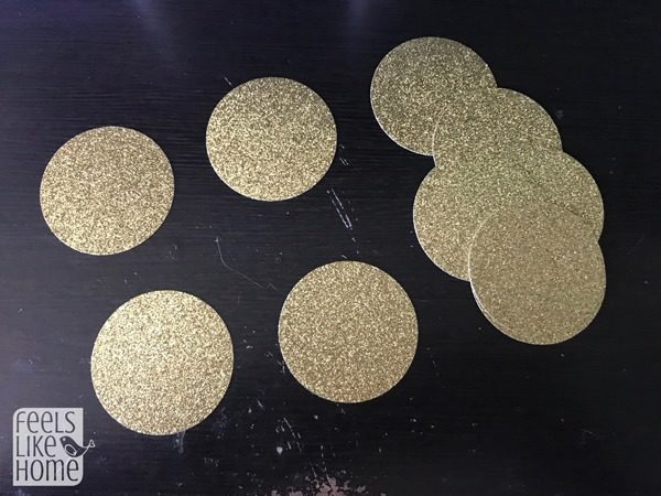 Cut large circles from gold paper