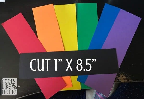 Cut strips of rainbow colored paper