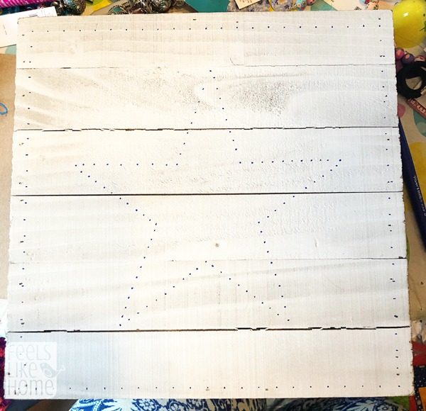 trace the string art pattern onto the wood