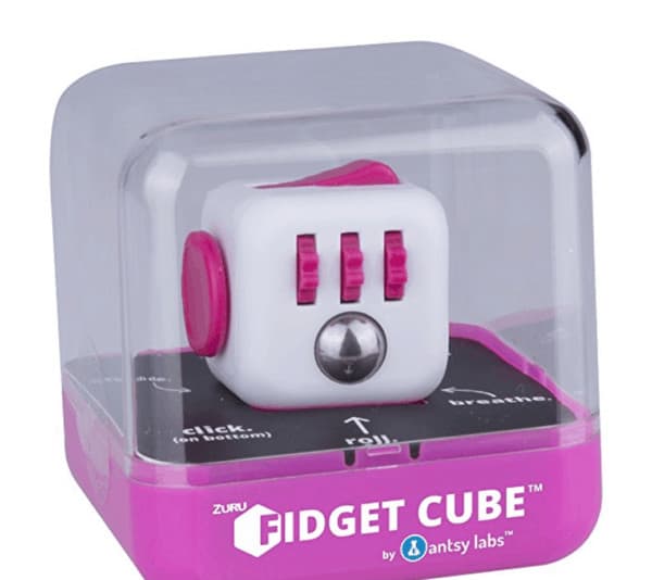 A fidget cube sitting on a table
