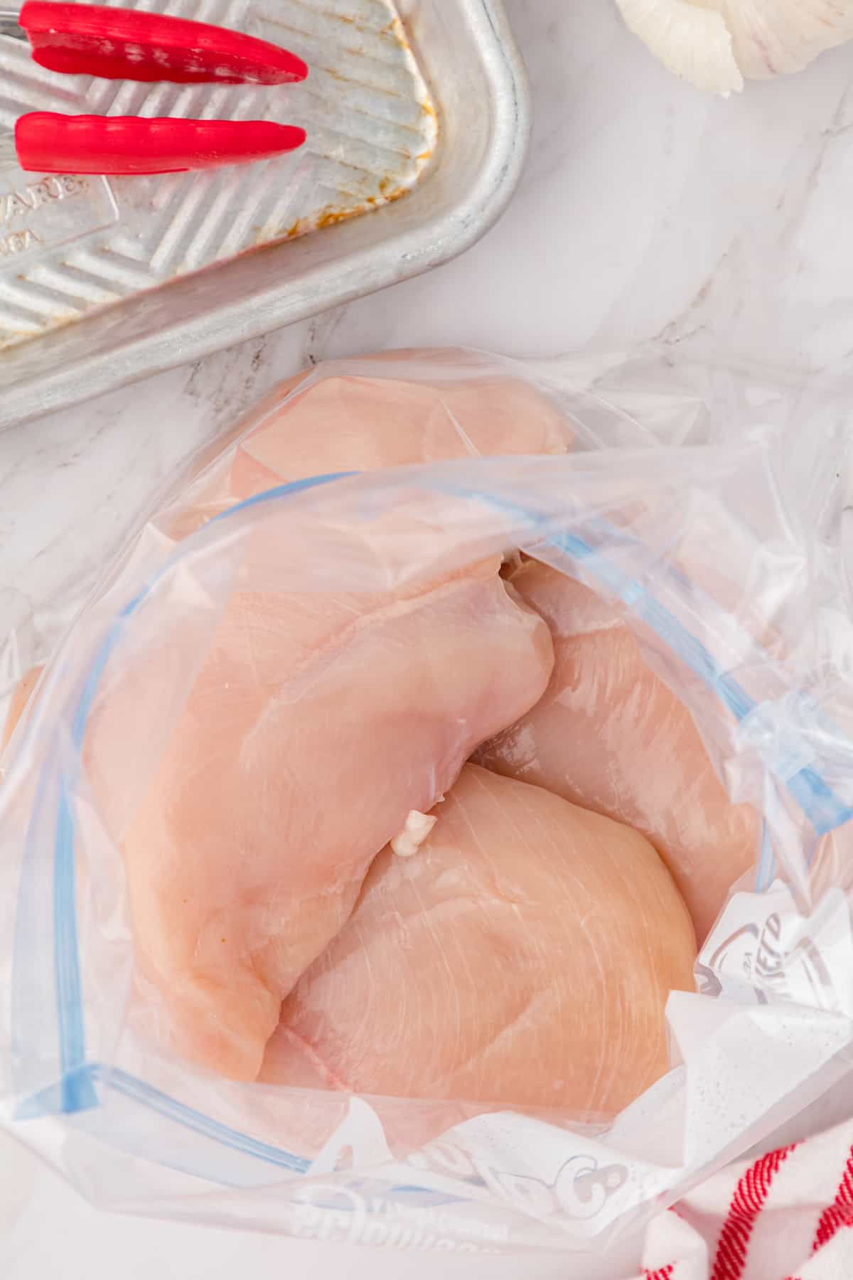 place chicken in a zippered plastic bag