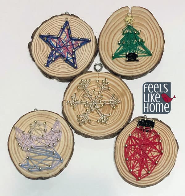 A close up of all the Christmas string art ornaments