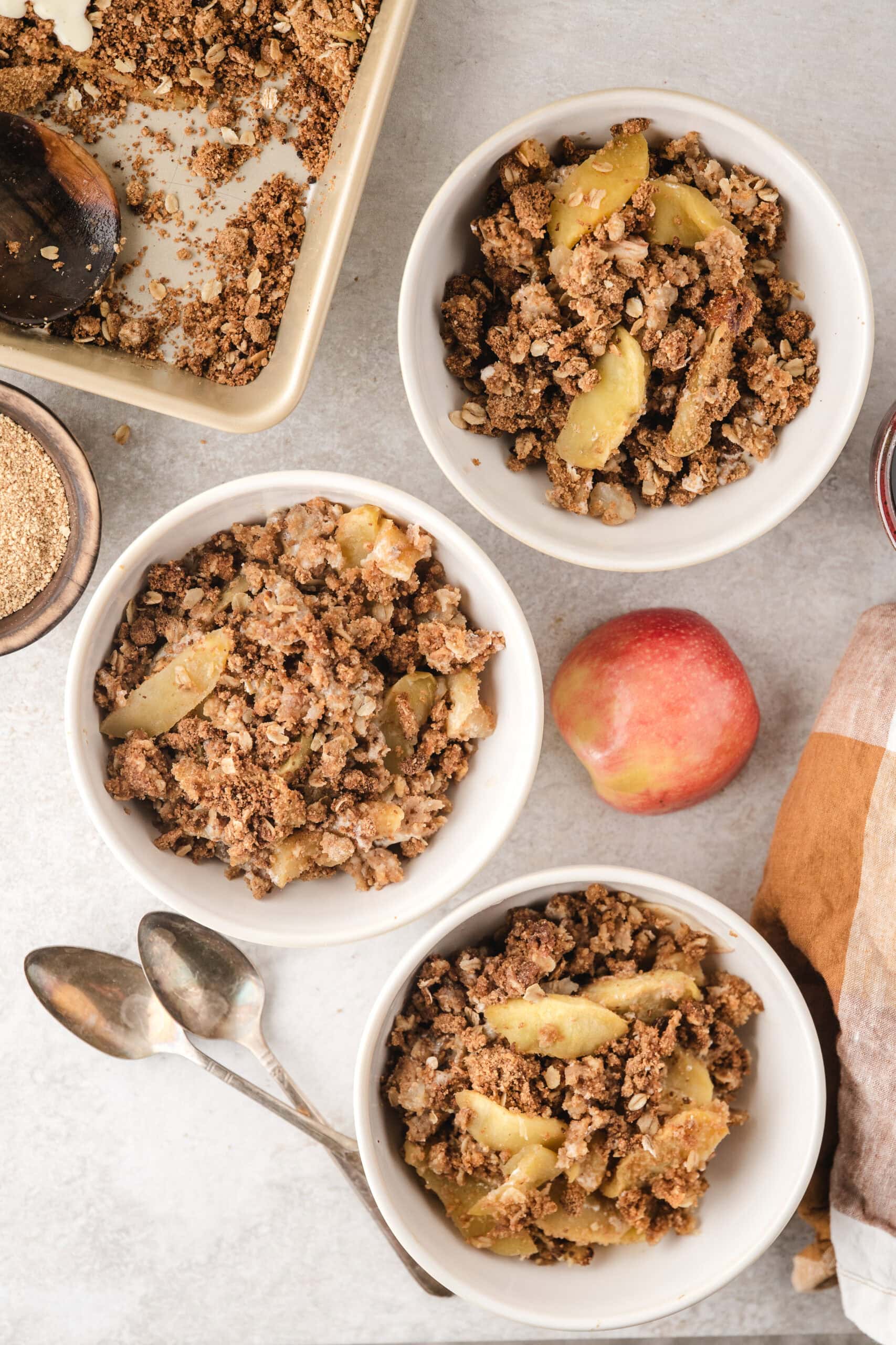 warm apple crisp served up in bowls, ready to eat