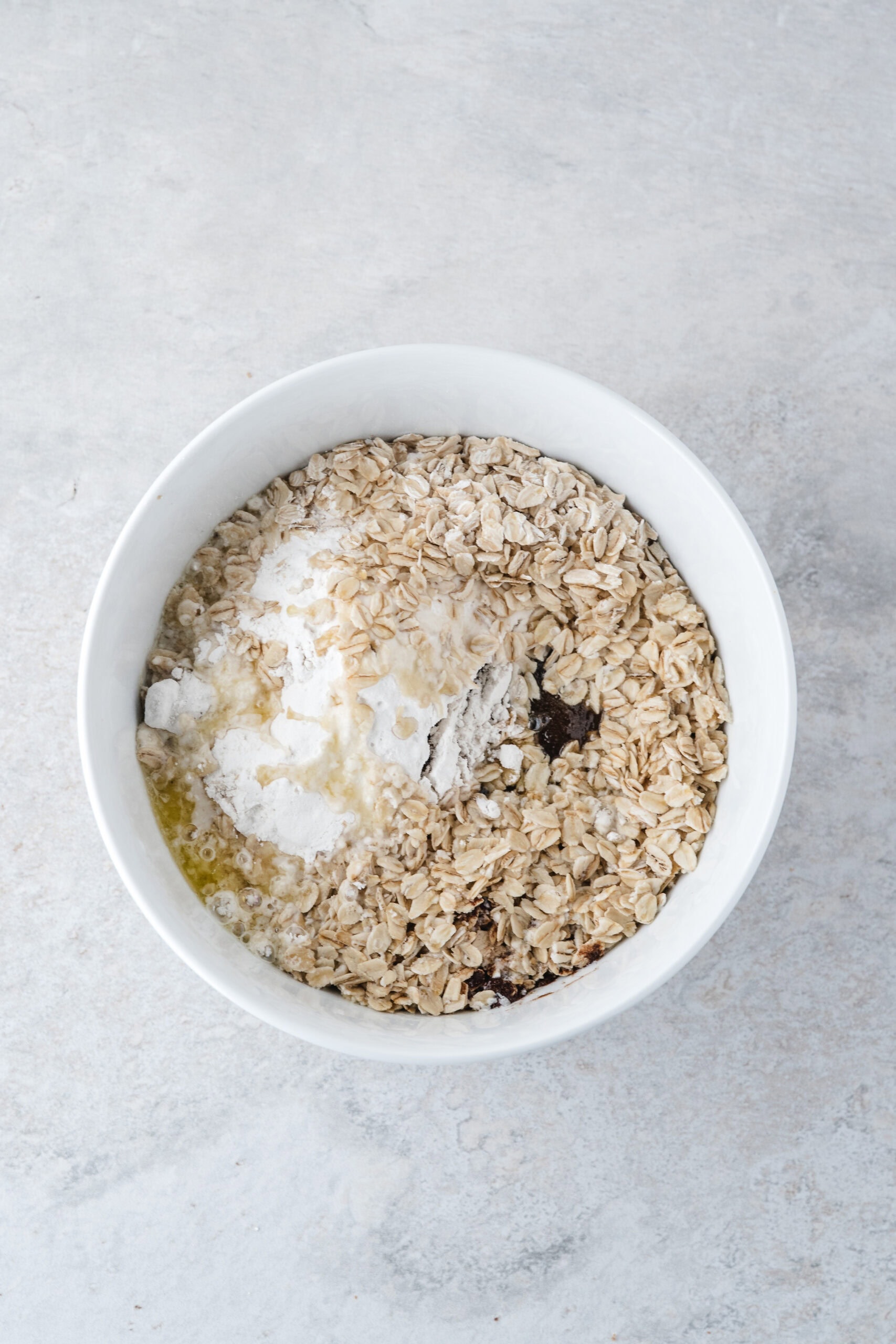 Wet and dry ingredients ready to be mixed up to add to the top of the apples in baking pan