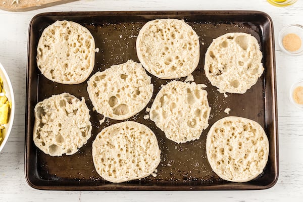 arrange the English muffins on a second baking sheet