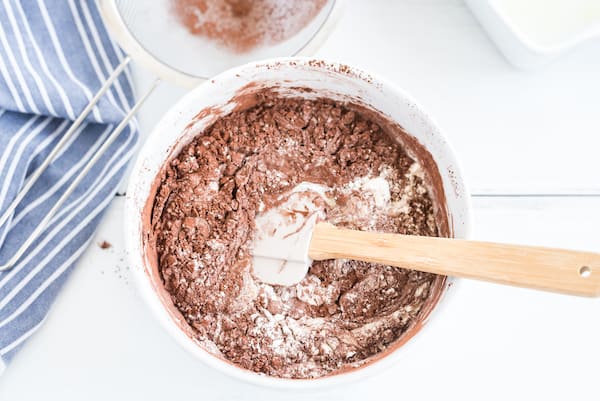 mixing the batter with the cocoa powder