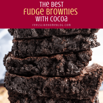 a stack of fudge brownies on a cutting board
