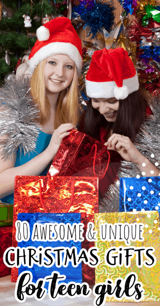 two teen girls looking at Christmas presents