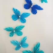 blue butterflies on a wall