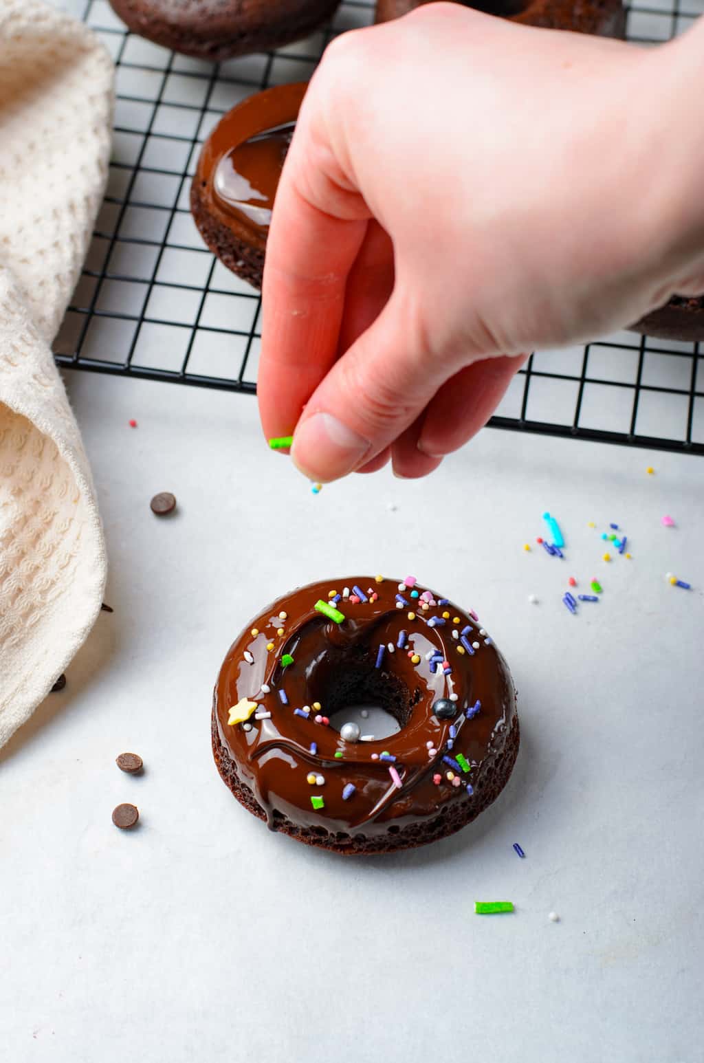 garnish the double chocolate donut with sprinkles