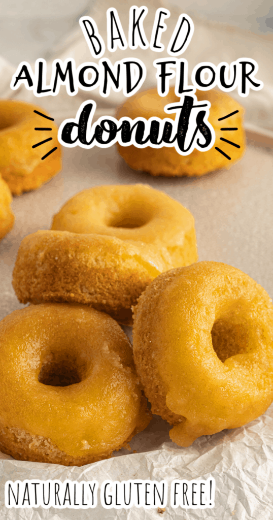 a pile of gluten free almond flour donuts with golden glaze