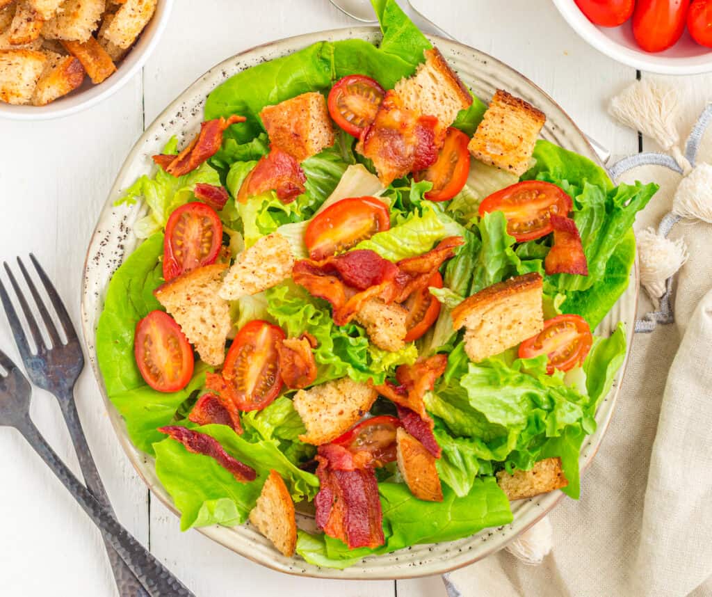 BLT salad assembled on a white plate