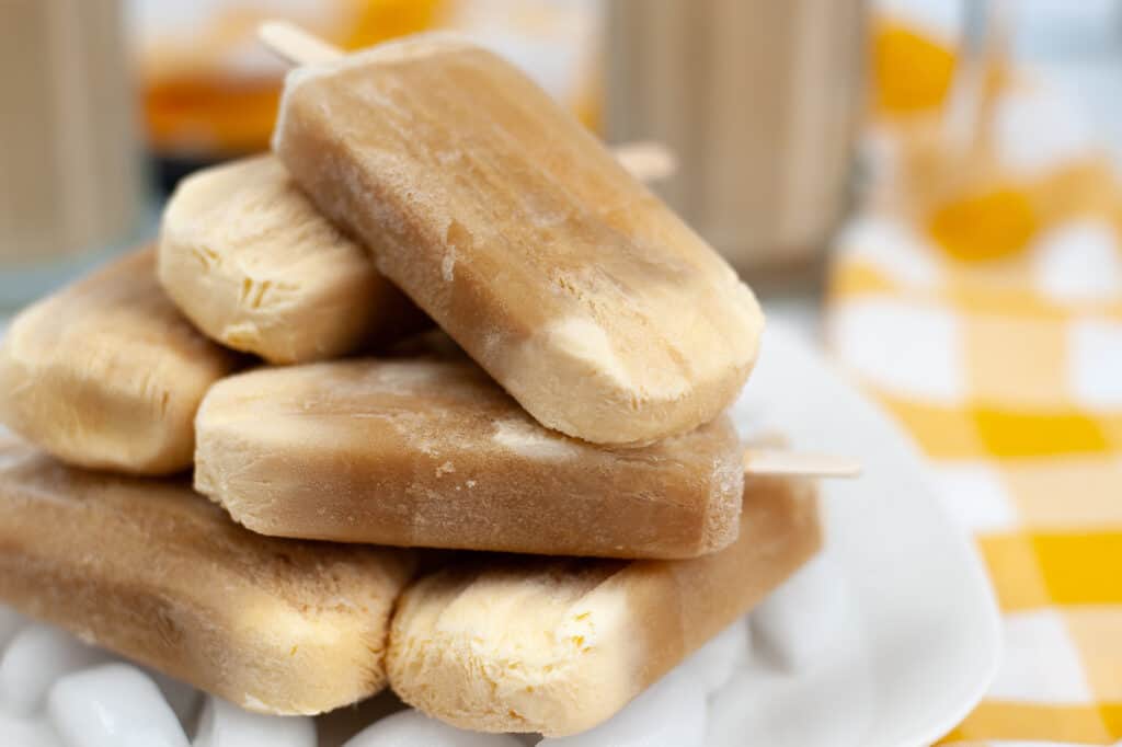 a pile of root beer float popsicles