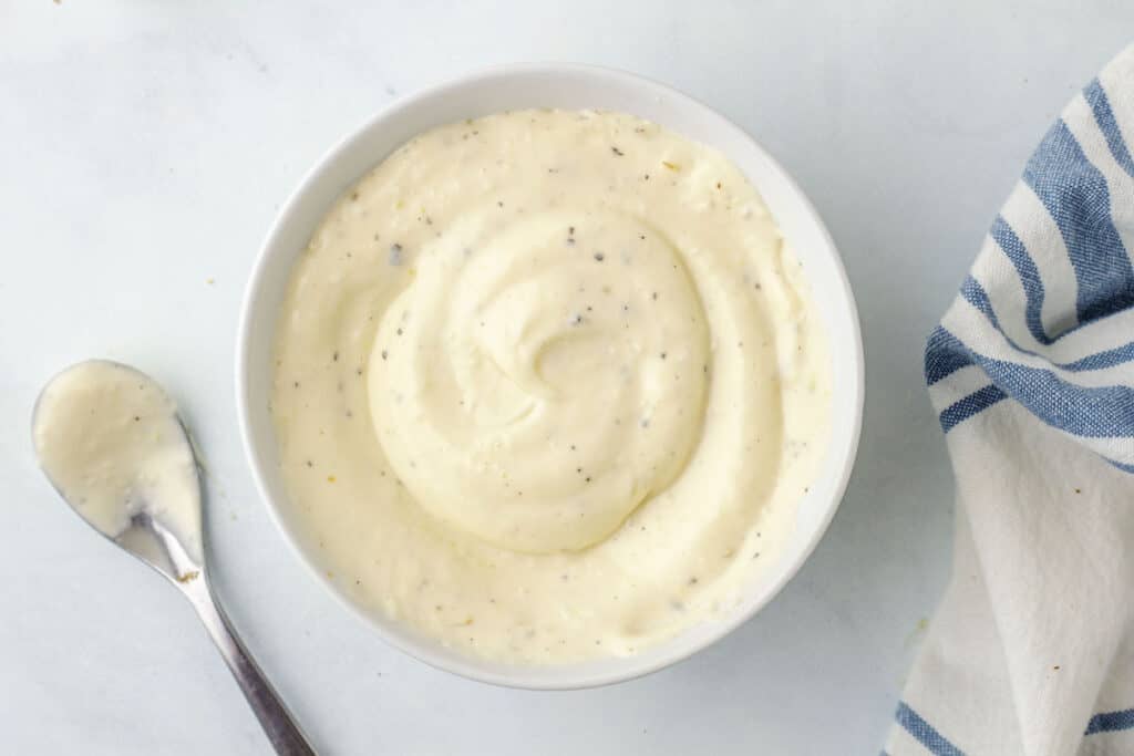 lemon garlic aioli in a white bowl