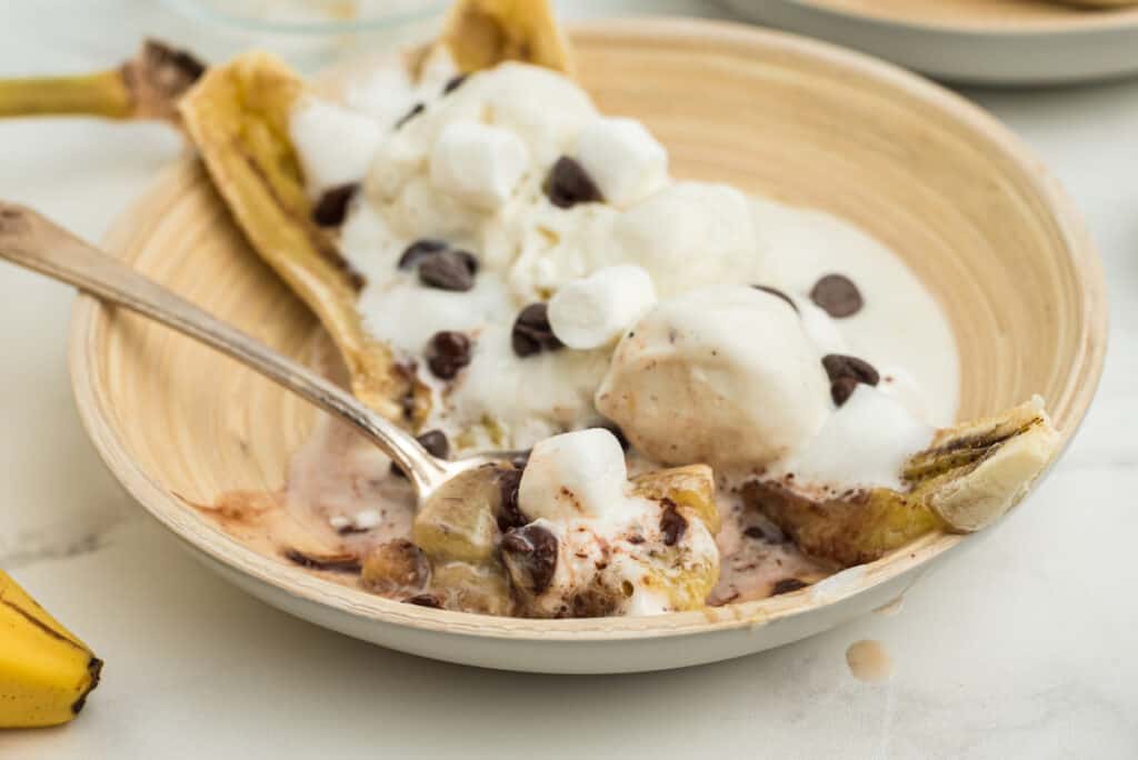 one bite of a banana boat ice cream sundae