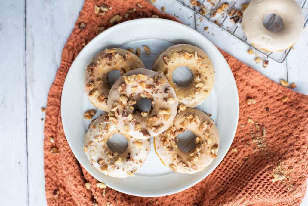 a plate of pumpkin spice donuts