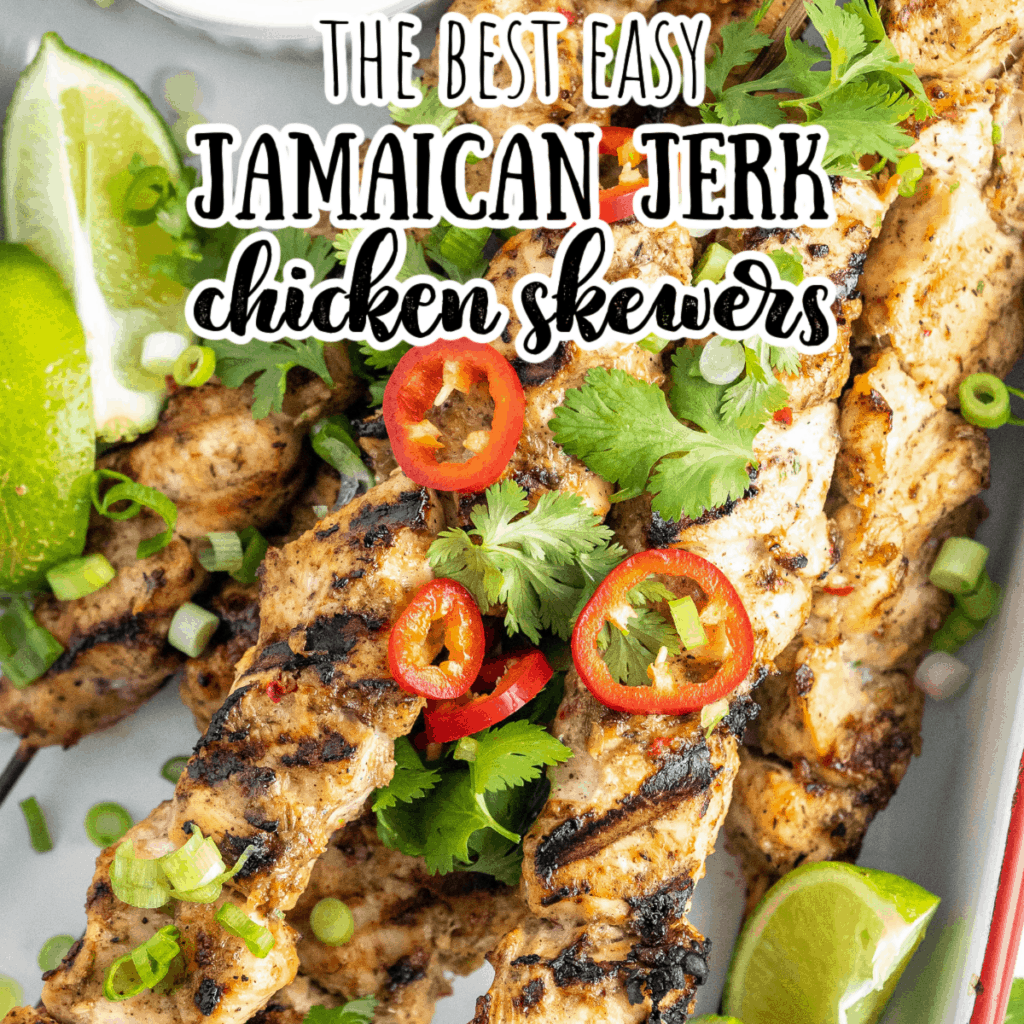 jerk chicken skewers topped with fresh cilantro and hot peppers with the title \"The best easy Jamaican Jerk chicken skewers\"