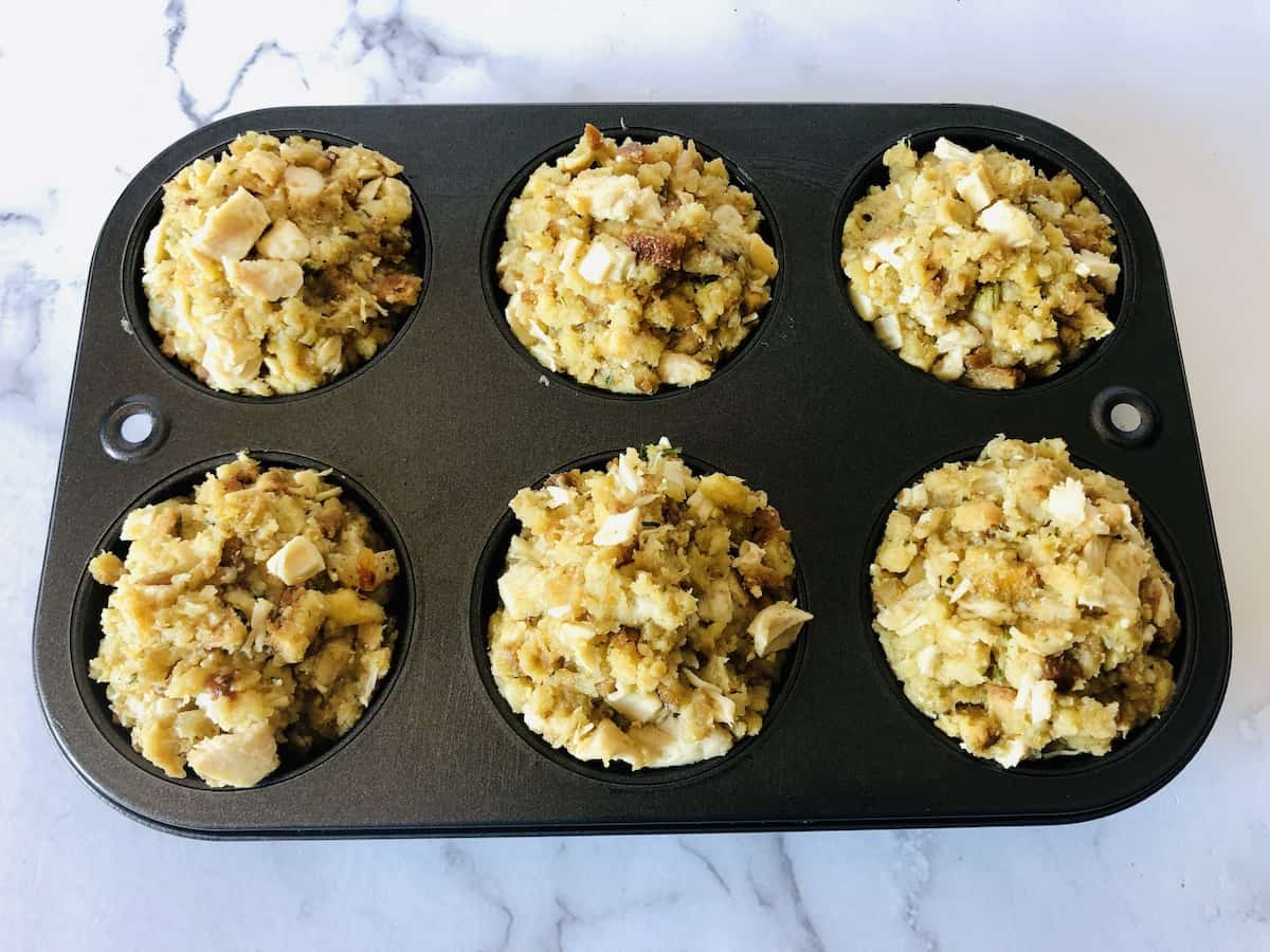 turkey and stuffing mixture in the muffin pan