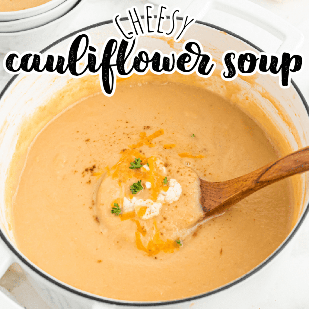 cheesy cauliflower soup in a large white pot