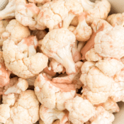 a close up of cauliflower marinated in red wine vinaigrette