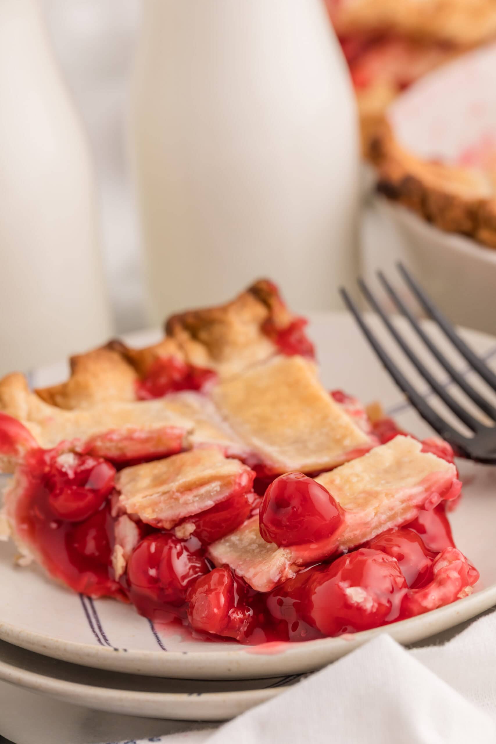 Homemade cherry pie with flaky golden brown crust