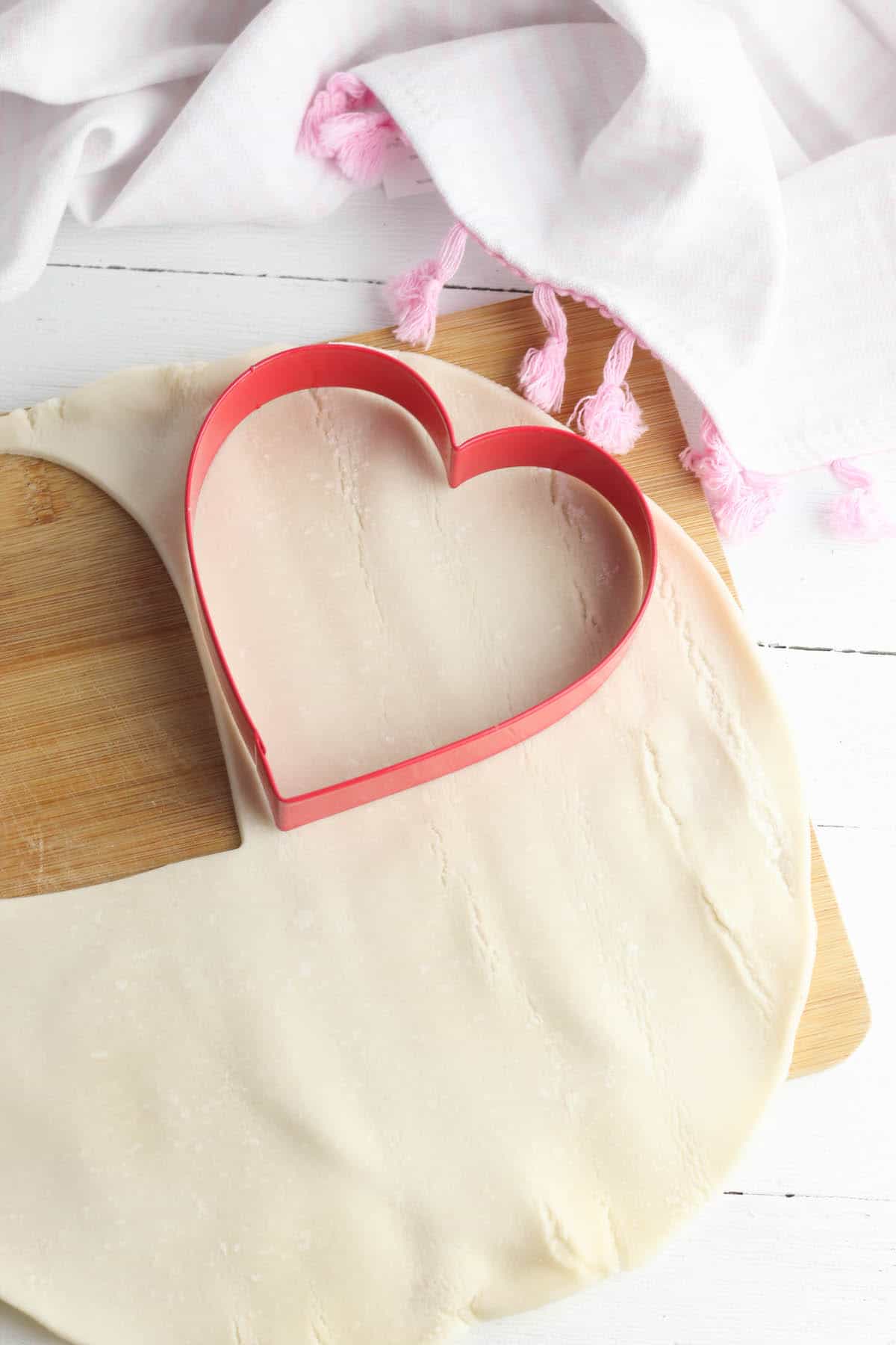 pie crust with a heart shaped cookie cutter