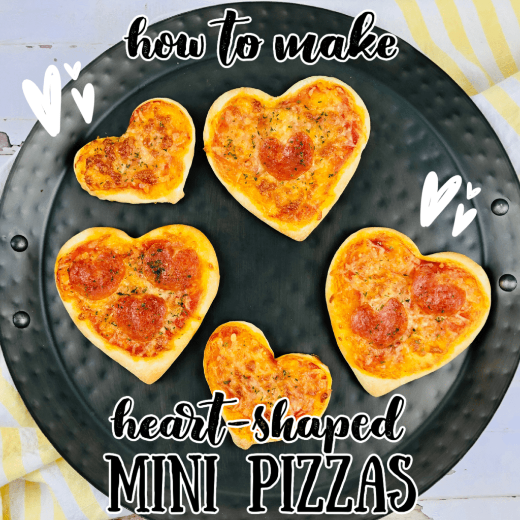a plate of heart shaped mini pizzas