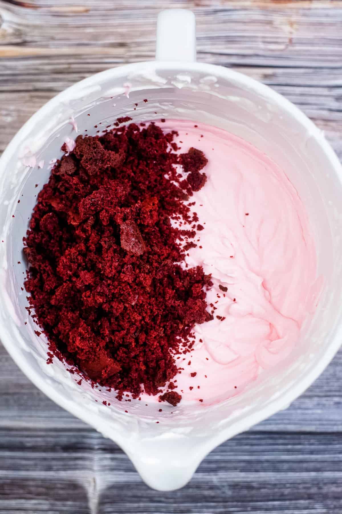 add crumbled red velvet cake to the ice cream