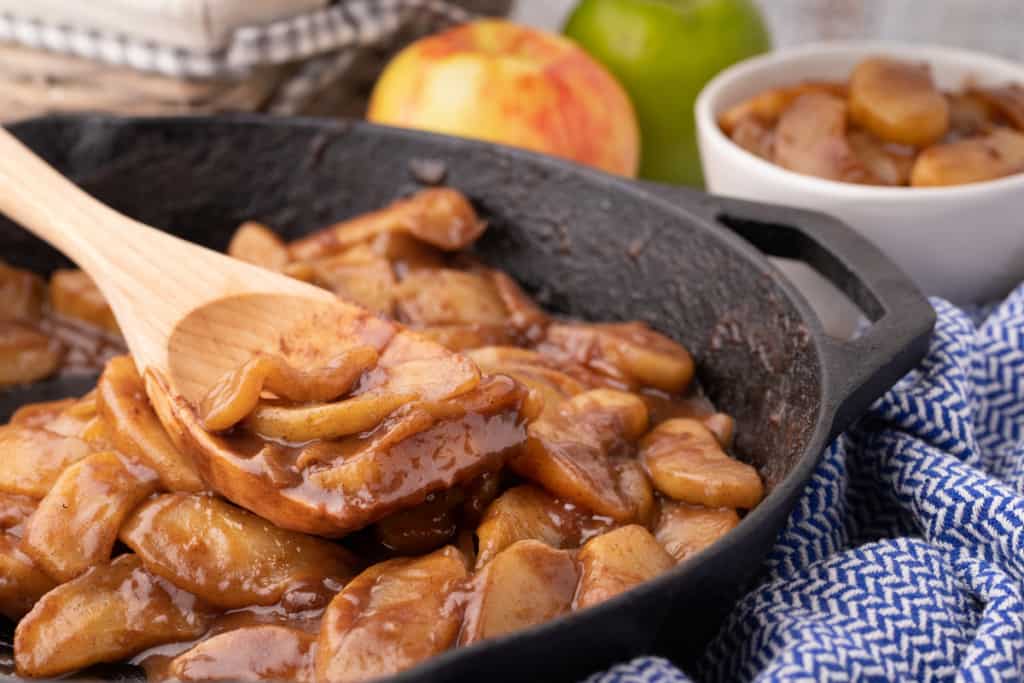 a skillet full of fried apples