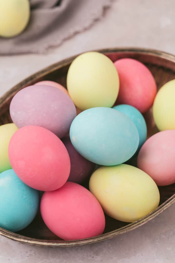 a plate full of dyed Easter eggs