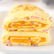 two ham and cheese omelet rolls, one on top of the other