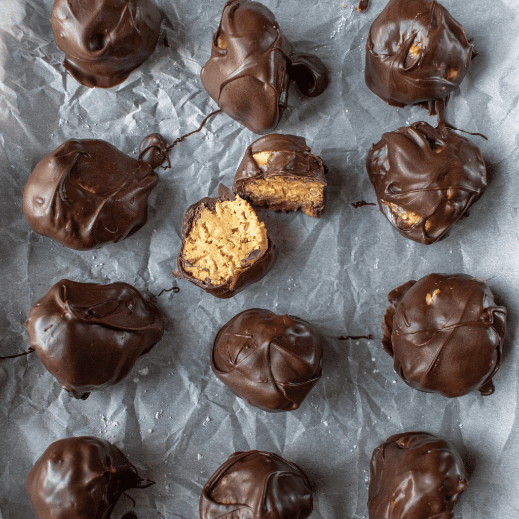 peanut butter balls on wax paper