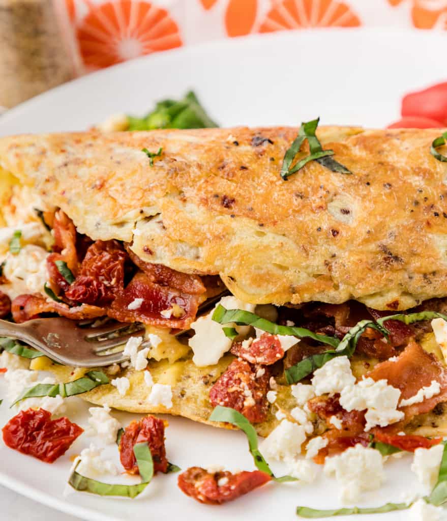 The Best Bacon Omelet Recipe with Sun-Dried Tomato and Feta Cheese