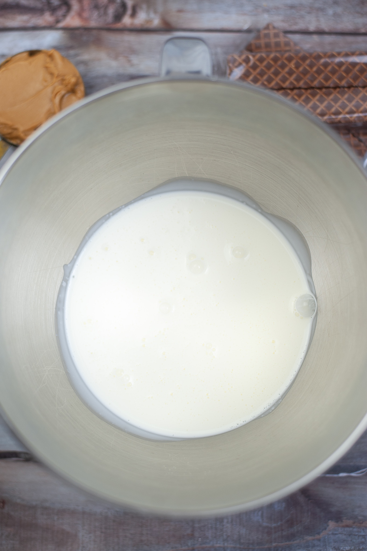 heavy cream in a mixing bowl