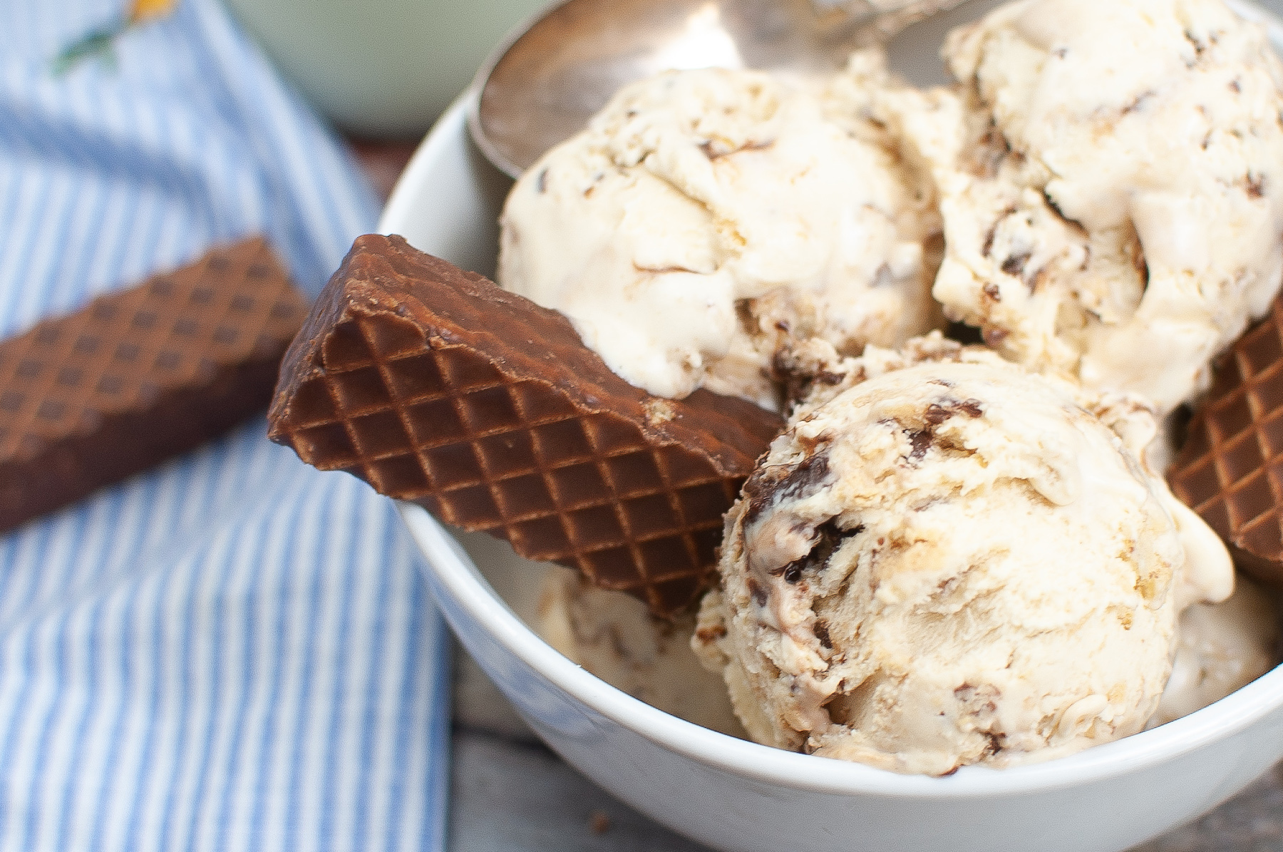 a close up of Nutty Buddy ice cream with melted chocolate and peanut butter