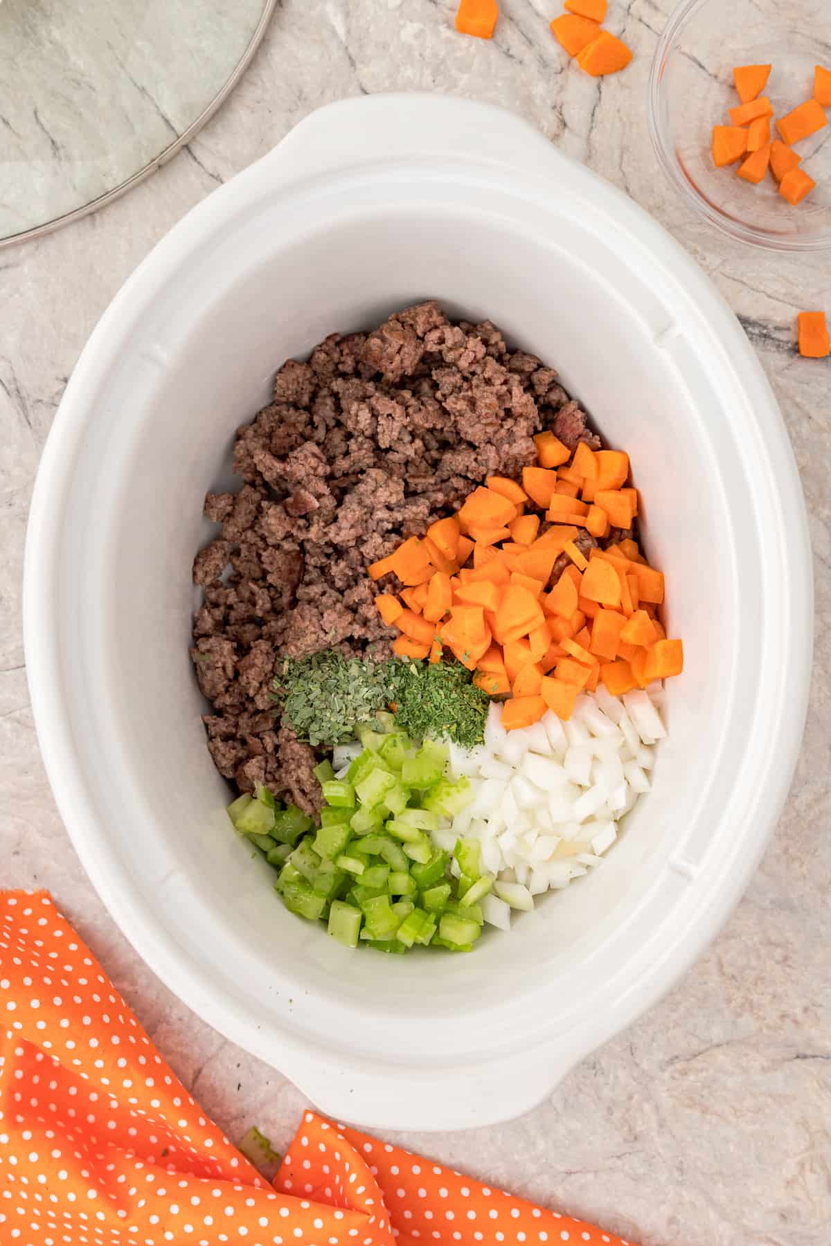 add veggies and ground beef to the crockpot