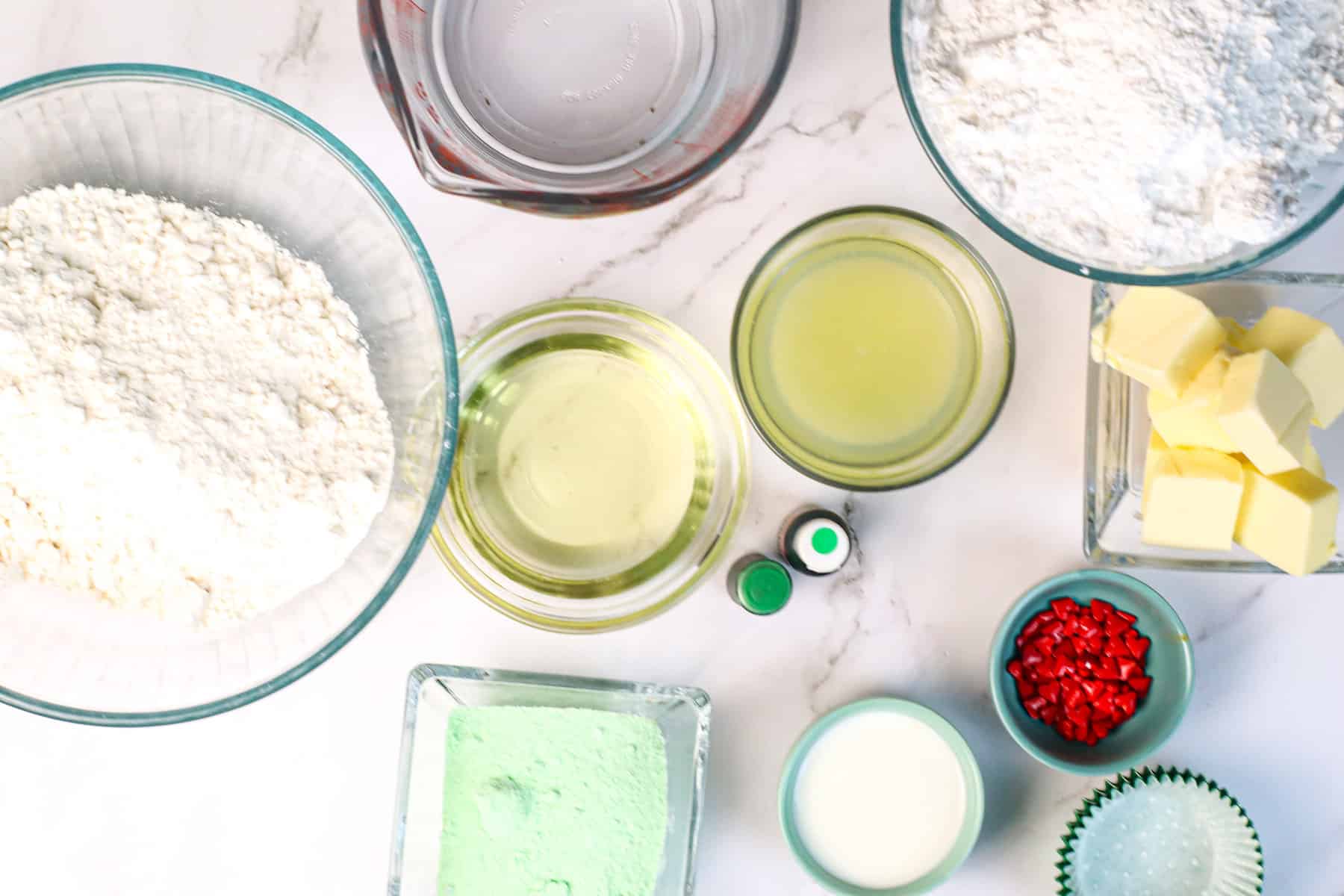 ingredients for Grinch pistachio cupcakes with French vanilla buttercream frosting