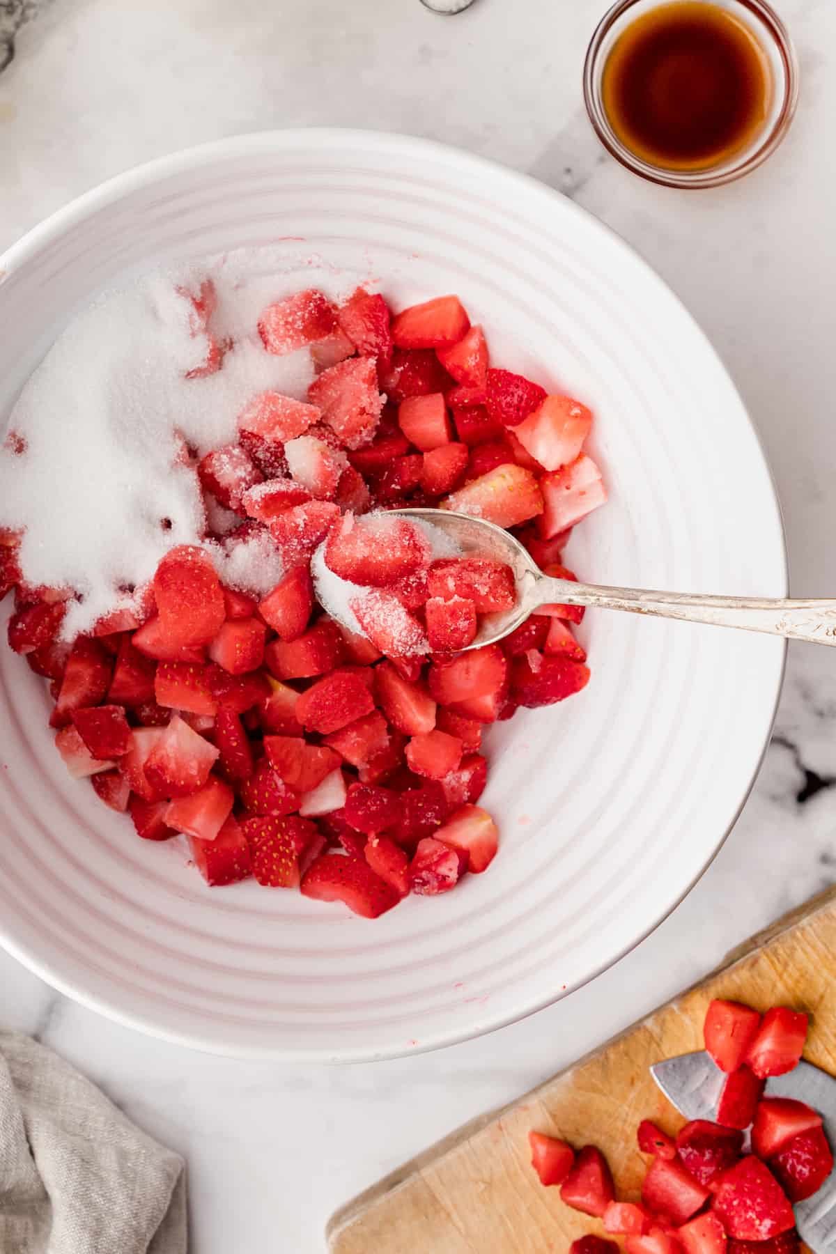 mix the strawberries and sugar