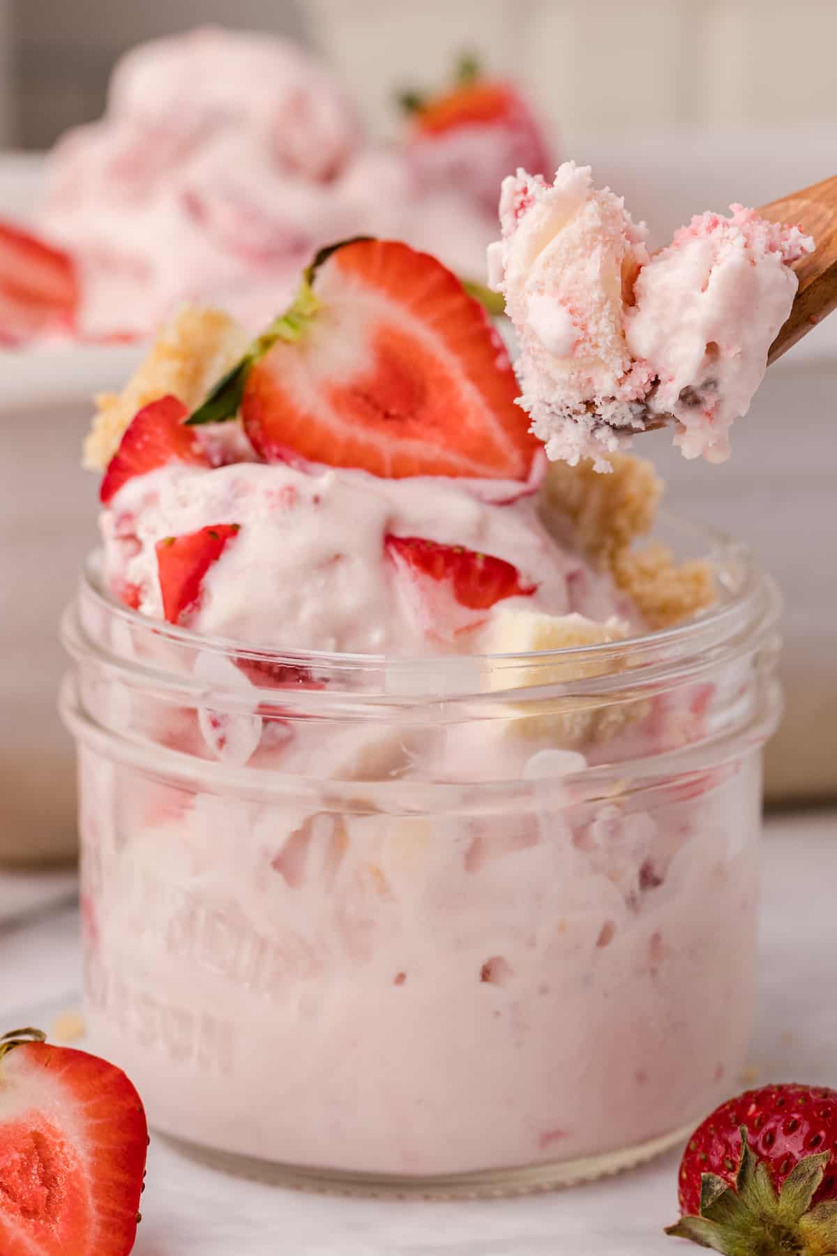strawberry cheesecake ice cream in a small jar