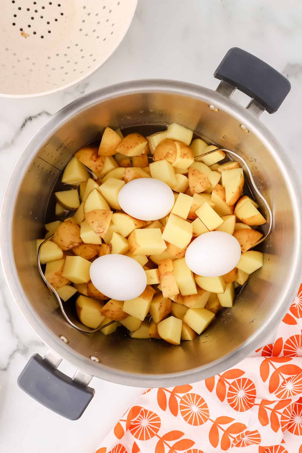 add the potatoes and eggs to the Instant Pot