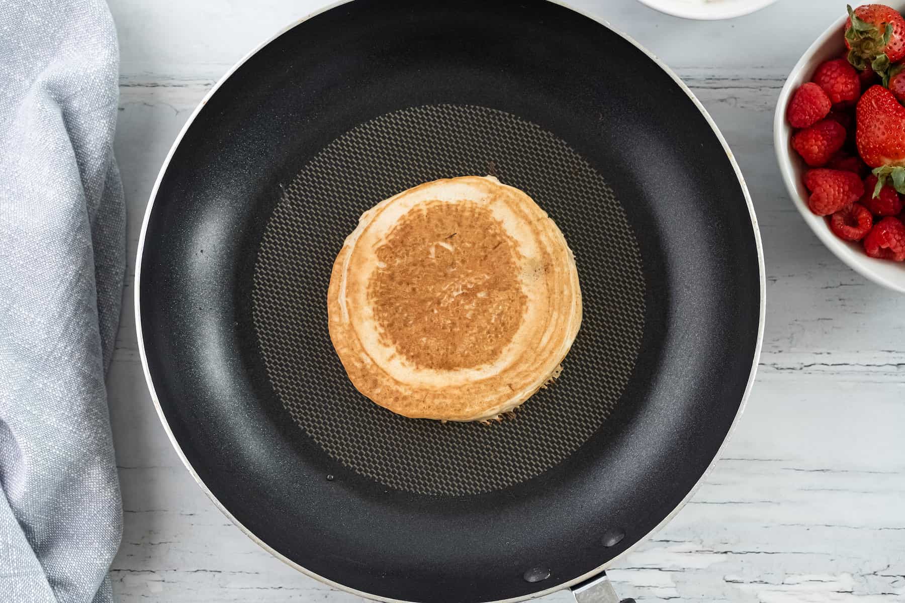 one pancake in a skillet