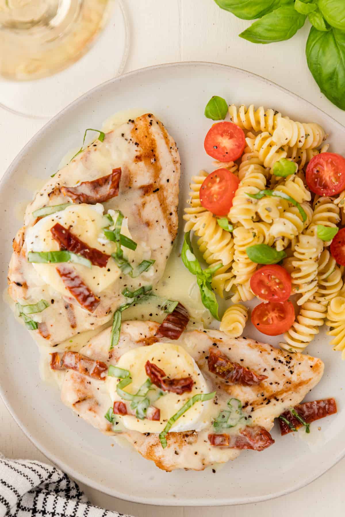 a plate of pasta and Chicken Bryan from Carrabba's