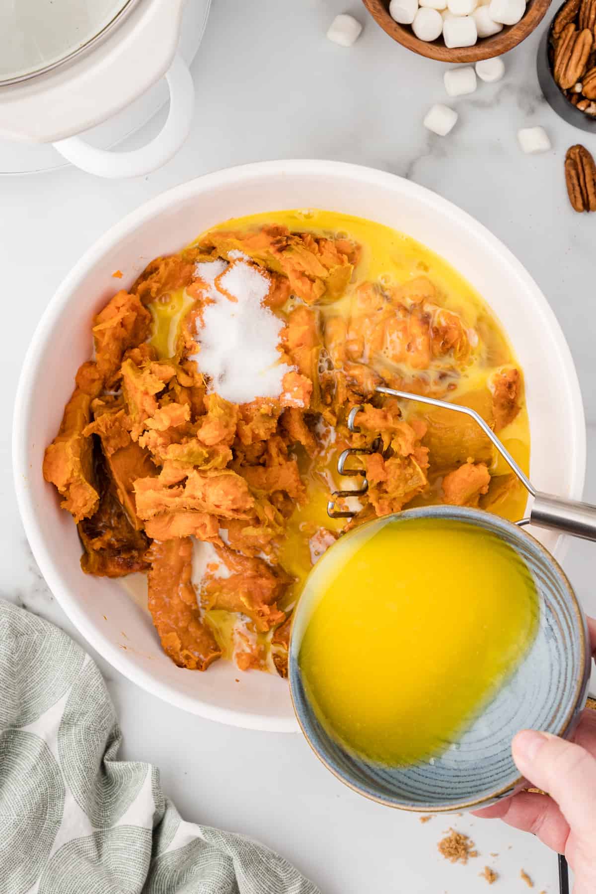 add the eggs to the mashed sweet potatoes