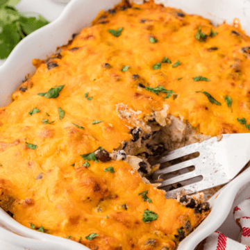 Mexican chicken casserole layered with cheese