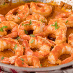 garlic buffalo shrimp in a skillet