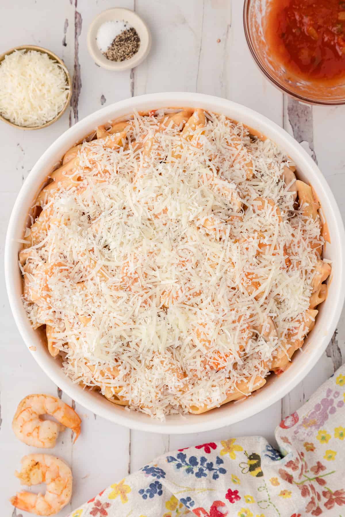 Cheesy Shrimp Casserole with Velveeta topped with Parmesan cheese