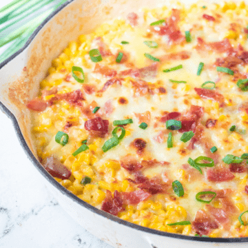 cheesy skillet corn with bacon in a skillet