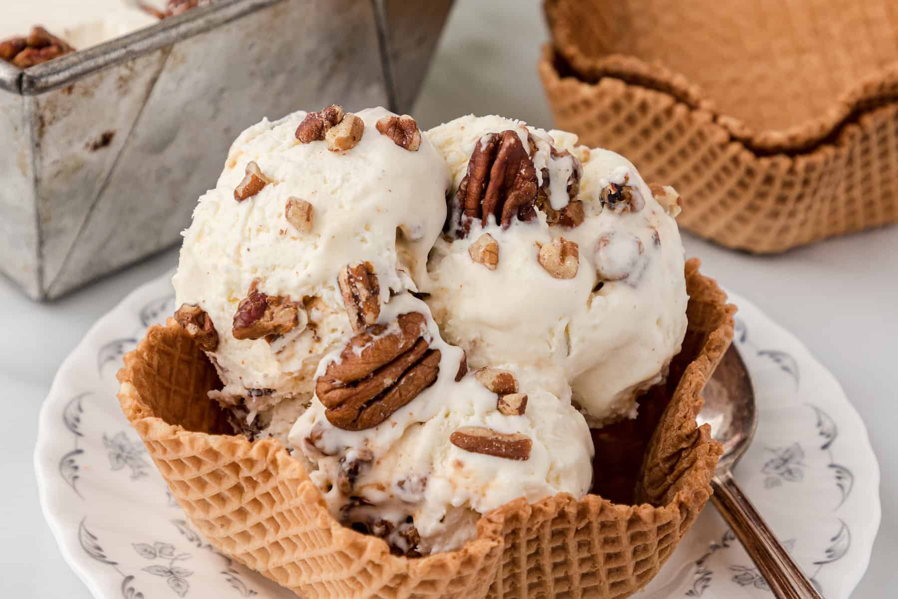 no churn butter pecan ice cream in a waffle bowl